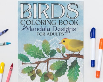 May include: A colouring book with a blue background and the title "Birds Colouring Book Mandala Designs for Adults". The cover features a yellow bird perched on a branch with green leaves and acorns.