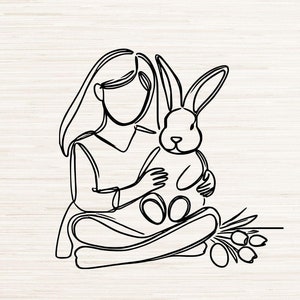 May include: Line art illustration of a girl holding a bunny rabbit. The girl is sitting with her legs crossed and the bunny is sitting on her lap. There are flowers and eggs around them.