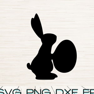 May include: Black silhouette of a rabbit holding an egg.  SVG, PNG, DXF, EPS, JPG, PDF.