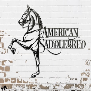 May include: Black metal silhouette of a horse with its leg raised, with the text "AMERICAN SADDLEBRED" in a decorative font.