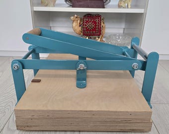 Linoldruckmaschine , Linoldruckpresse , Druckherstellungspresse, Hand-Linolpresse, Prägerelief-Linolpresse.