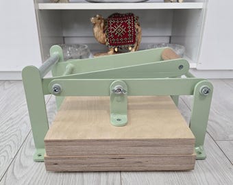 Linoldruckmaschine , Linoldruckpresse , Druckherstellungspresse, Hand-Linolpresse, Prägerelief-Linolpresse.