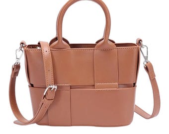 May include: A brown leather tote bag with a woven design and a detachable shoulder strap.
