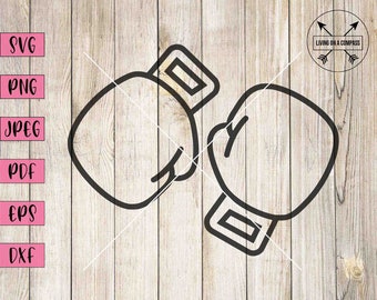 May include: Black outline of two boxing gloves, a design element for sports or fitness themes. The image includes file type options: SVG, PNG, JPEG, PDF, EPS, and DXF. The background is a light wood grain.