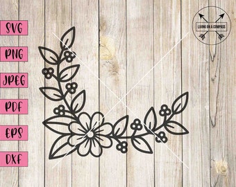 May include: Black and white floral corner design with leaves and berries. This design is perfect for crafting projects, scrapbooking, and more.