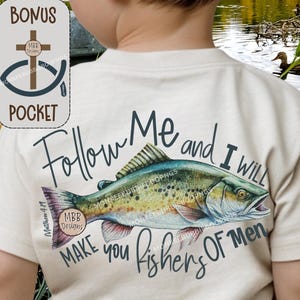 May include: A beige t-shirt with a fish graphic and the text "Follow Me and I WILL MAKE you Fishers OF Men." The design includes a fish illustration with blue, green, and red accents. The shirt also features a bonus pocket design.