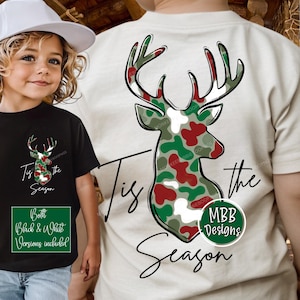May include: Black and beige short-sleeve shirts with a deer head design in camouflage colors of green, red, and white. The text "Tis the Season" is written in cursive. The image also includes the text "Both Black & White Versions included".