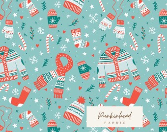 May include: A seamless pattern featuring a variety of winter-themed illustrations, including mittens, hats, scarves, candy canes, and snowflakes. The background is a light blue color. The text "Pumpkinhead Fabric" is included in the design.