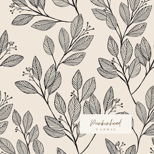 May include: A seamless pattern featuring black and white line drawings of leaves and berries on a cream background. The text "Pumpkinhead Fabric" is in the lower right corner of the image.