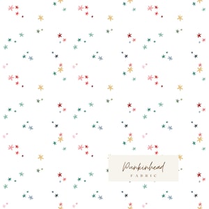 May include: White fabric with a repeating pattern of small, colorful starbursts in red, teal, pink, gold, and navy blue. The text "Punkinhead Fabric" is displayed in a rectangular box in the lower right corner.