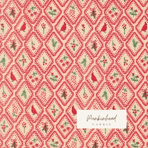 May include: A cream-colored fabric featuring a repeating diamond pattern outlined in red. Inside each diamond are small illustrations of red cardinals, green pine sprigs, red berries, and flowers. A white rectangular label reads Punkinhead FABRIC.