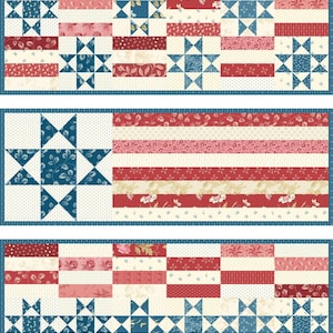 May include: A patriotic quilt featuring a star and stripe design in shades of red, white, and blue. The quilt showcases various patterns, including stars and floral prints, with a blue border. The overall theme is Americana.