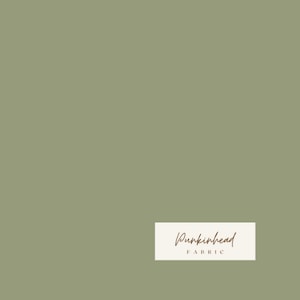May include: Solid sage green fabric swatch with the text "Pumpkinhead Fabric" in brown lettering on a white label.
