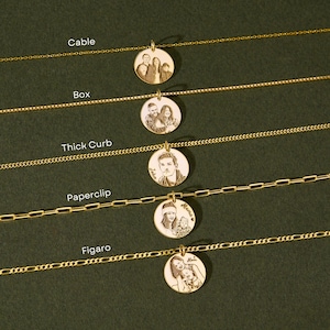 May include: Five gold necklaces with different chain styles, each featuring a round pendant with a personalised photo engraved on it. The chains are labelled "Cable", "Box", "Thick Curb", "Paperclip", and "Figaro".