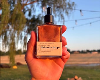 shimmer drops // hydrating body oil // natural moisturizer // summer skincare // lightweight body oil // illuminating oil