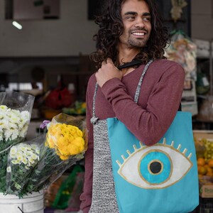 evil eye bag,
evil eye handbag,
evil eye beach bag,
evil eye tote bag,
evileye shoulder bag,
turkish coin purse,
greek evil eye,	
evil eye pouch,	
evil eye purse,	
evil eye makeup bag,	
evil eye travel bag,	
evil eye hippie bag,	
turkish evil eye,