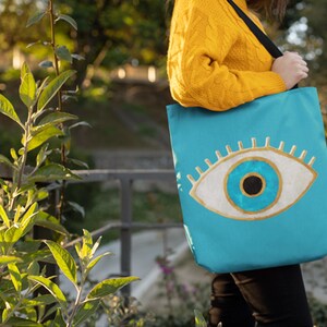 evil eye bag,
evil eye handbag,
evil eye beach bag,
evil eye tote bag,
evileye shoulder bag,
turkish coin purse,
greek evil eye,	
evil eye pouch,	
evil eye purse,	
evil eye makeup bag,	
evil eye travel bag,	
evil eye hippie bag,	
turkish evil eye,