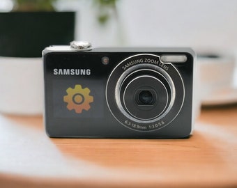 Rare Black Samsung PL100 Digital Camera - 12.2MP, Dual LCD Screens, 3x Optical Zoom, Compact & User-Friendly, Excellent Condition