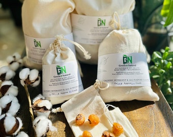 May include: A set of soap nuts in a white muslin bag. The soap nuts are a natural laundry detergent and are packaged in a white muslin bag with a green and white label that reads "Green & Natural All Natural 100% Organic Soap Nuts/Soapberries Hand selected premium De-seeded Hypoallergenic Biodegradable Compostable Laundry Detergent & All Purpose Cleaner 10 Oz/g Approx 200 Loads".