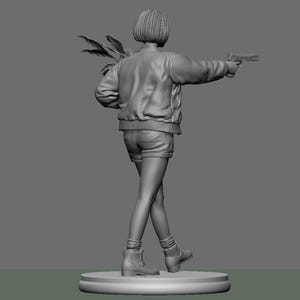 May include: A grayscale 3D-printed figurine of a person holding a handgun and a bundle of leaves. The figure is wearing a bomber jacket, shorts, and boots, standing on a circular base. The pose suggests action.
