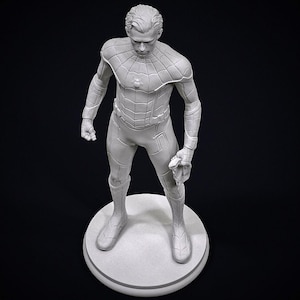 May include: A gray, three-dimensional statue of a superhero in a form-fitting suit, standing on a circular base. The figure is in a dynamic pose, holding a web-like accessory. The statue is detailed with textured panels and a spider emblem on the chest.