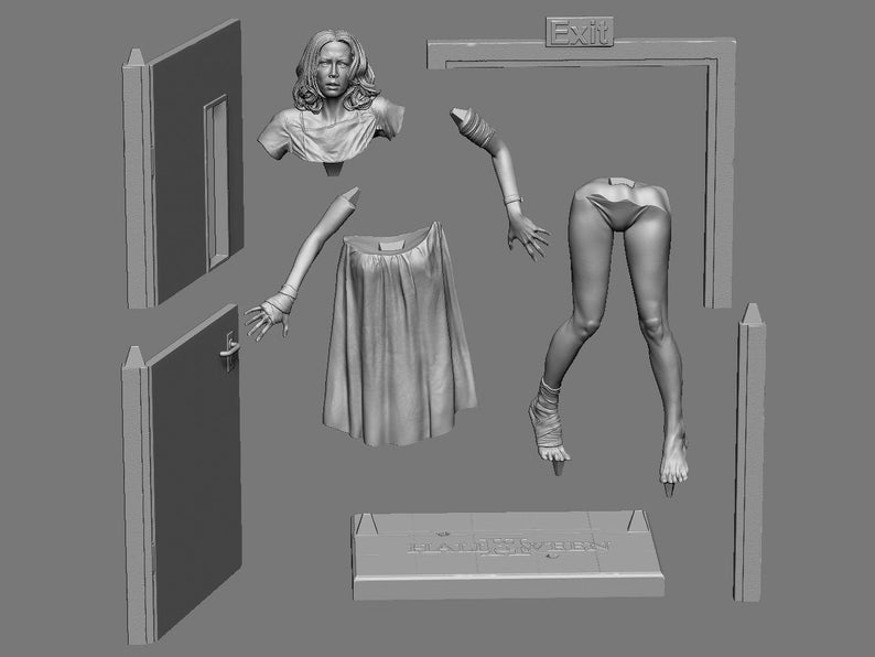 May include: A grayscale 3D model of a horror movie scene, featuring a woman's bust, arms, legs, and a dress, along with door frames and an exit sign. A base with the word "HALLOWEEN" is also present.