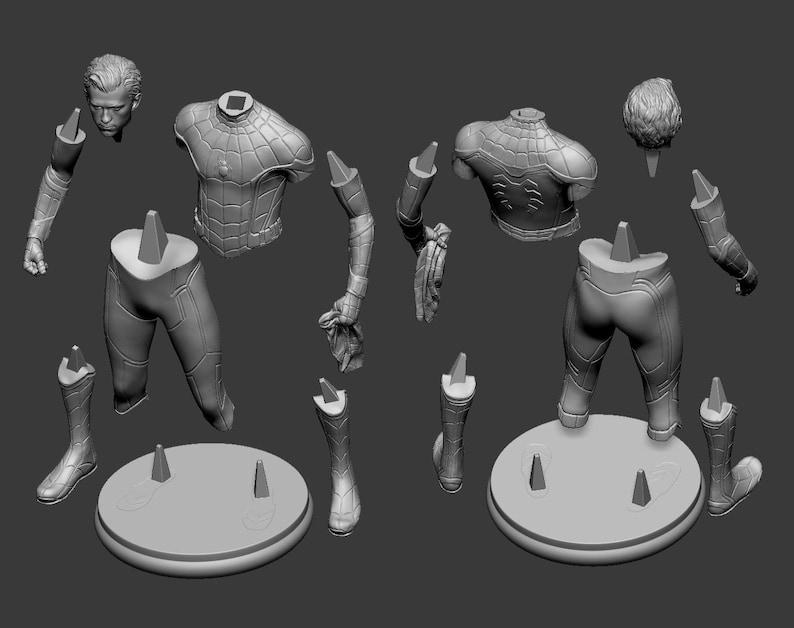 May include: A disassembled gray 3D-printed model of a superhero figure, featuring separate components like the head, torso, arms, legs, and boots. The pieces are arranged around two circular bases with supporting pegs, ready for assembly.