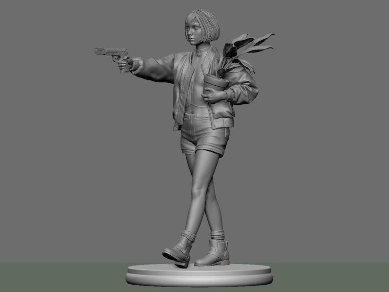 May include: A grayscale sculpture of a person holding a handgun and a potted plant. The figure is wearing a jacket, shorts, and boots. The sculpture is on a round base.