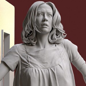 May include: A grayscale sculpture of a woman with a distressed expression. She wears a simple, short-sleeved dress. Her hair is wavy, and her gaze is directed upwards. The background is a deep red.
