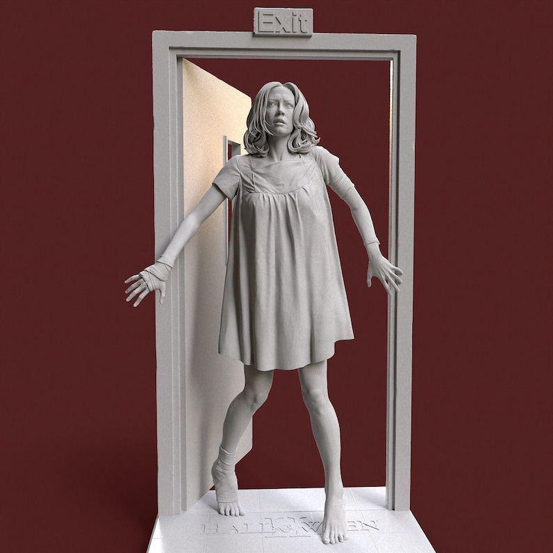 May include: A gray sculpture of a woman in a short dress, standing in a doorway with the word "Exit" above. The woman has her arms outstretched, and the word "Halloween" is at the base of the doorway.