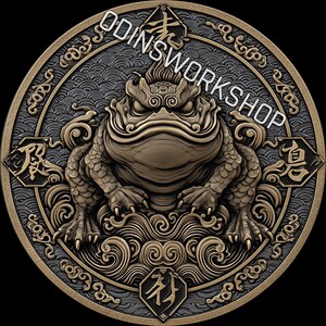 May include: A detailed, circular coin featuring a stylized frog with intricate detailing. The coin has a bronze and gray color scheme, with the text "ODINSWORKSHOP" and Asian-inspired symbols. The frog sits atop a wave design.