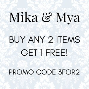 May include: A white and blue patterned background with black text that reads "Mika & Mya" and "BUY ANY 2 ITEMS GET 1 FREE!" and "PROMO CODE 3FOR2".