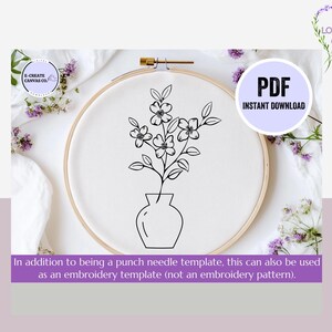 May include: Black and white line art illustration of a vase with flowers. The image is in a hoop on a white fabric background. The text "PDF INSTANT DOWNLOAD" is in the upper right corner of the image.