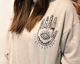 Hand embroidered hamsa with evil eye grey hoodie, evil eye embroidery spiritual clothing, Afghan woman refugee maker, Bibi Collective