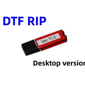 May include: A red and black USB flash drive with the text "Ver 11.2" on a white label. The words "DTF RIP" and "Desktop version" are also displayed. The flash drive is a data storage device.