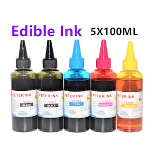 May include: Five 100 ml bottles of edible ink in black, cyan, magenta, and yellow. The bottles are labeled "Peter Ink" and have the color and "Edible" printed on them.
