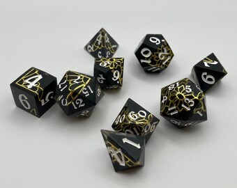 Set di dadi nero e oro