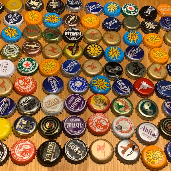 Metal beer and bottle caps! Tons of different varieties and types. (These caps have some dents, dimples or scratches). Great value!