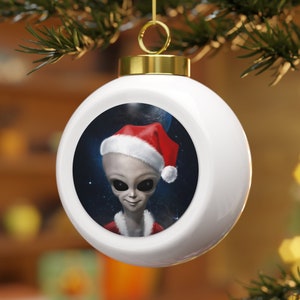 The Santa Alien From Space 3&quot; Christmas Ornament Will Add A Touch Of Humor To Your Annual Holiday Tree Decorations