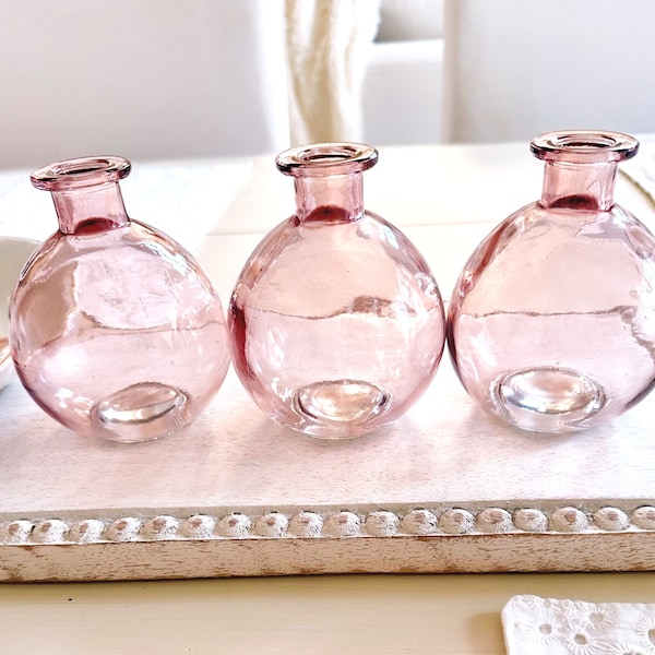Roze ronde glazen vaas woondecoratie