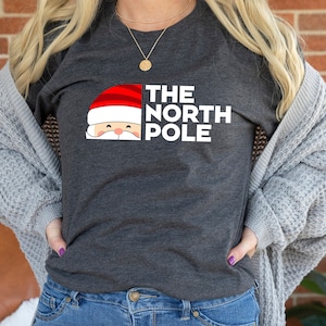 Christmas, Gift For Christmas, The North Pole, Christmas T-shirt, North Pole Shirt, Women Christmas Shirt, 2023, Gift Tees