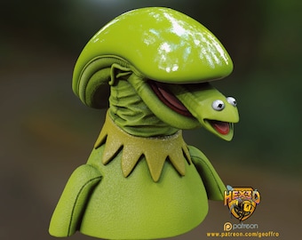 May include: A 3D-rendered sculpture of Kermit the Frog with an alien-like head. The sculpture is primarily green with a light green head, a green body, and a yellow collar. The frog's mouth is open, revealing a red interior. The sculpture has a textured surface.
