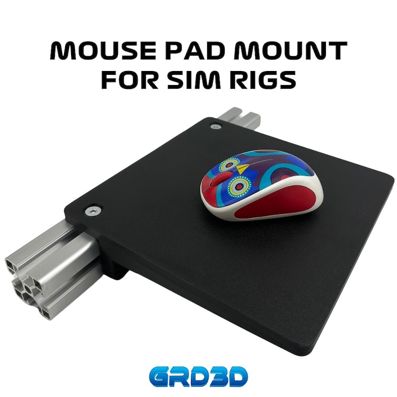 May include: Black mouse pad mount for sim rigs, attached to a silver aluminum extrusion. The mount is designed to hold a mouse pad and a mouse, which is shown in the image. The mouse is colorful with a blue, red, and white design.