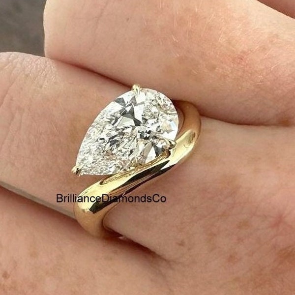 Horizontal Tear Drop Unique Engagement Ring, 3.00 CT Pear Cut Moissanite Diamond Set In Corner On Wave Shank, 14k Yellow Gold Wedding Ring
