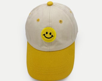 Czapka z daszkiem Smilee Cap dla dzieci | w kolorze żółtym, różowym + pomarańczowym | 1-4 lata | Czapka dziecięca z naszywką z uśmiechniętą twarzą, 100% bawełna
