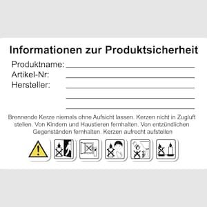 Könnte beinhalten: Ein weißes rechteckiges Etikett mit dem Text "Informationen zur Produktsicherheit" und Sicherheitshinweisen. Das Etikett enthält leere Zeilen für Produktname, Artikelnummer und Hersteller sowie Sicherheitssymbole.