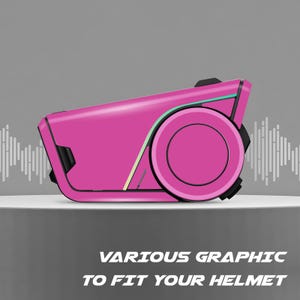 May include: A pink helmet communication device with a circular design and black accents. The device has a sleek, modern aesthetic. The text "VARIOUS GRAPHIC TO FIT YOUR HELMET" is displayed at the bottom.