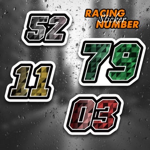 May include: Four racing numbers with a geometric pattern. The numbers are 52, 79, 11, and 03. The numbers are in different colors, including black, green, gold, and red.