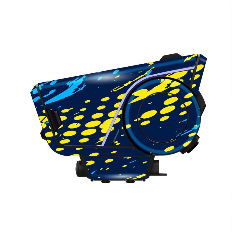 May include: A futuristic device with a navy blue base, adorned with yellow and blue splatter paint. The design includes a circular element and angular shapes, creating a modern aesthetic. The device is set against a white background.