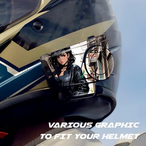 May include: Motorcycle helmet with a graphic of a woman in a black leather jacket. The helmet is black, blue, and gold. The text "VARIOUS GRAPHIC TO FIT YOUR HELMET" is at the bottom.